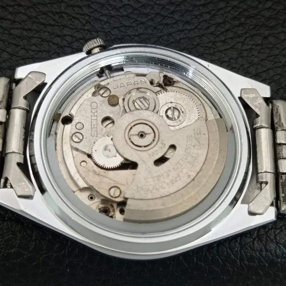 Vintage 1979 Seiko Automatic Mens Silver Watch W/daydate & White accents